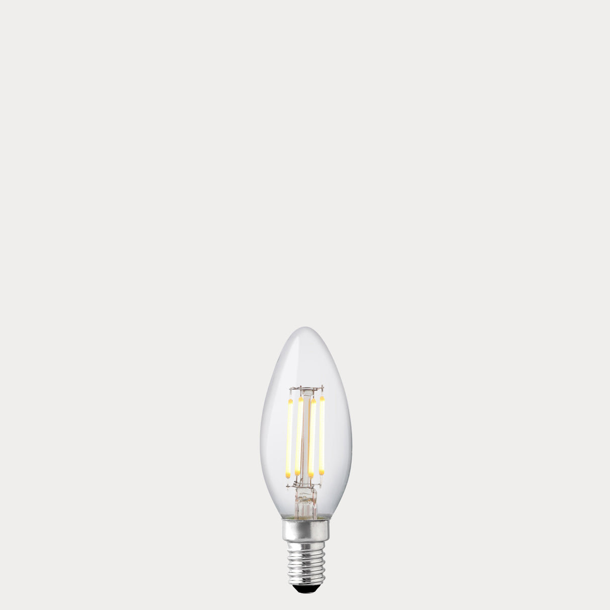 Dulora 4W 12-24 Volt AC/DC Candle LED Bulb E14 Clear in Warm White illuminated with warm glow through clear candle glass