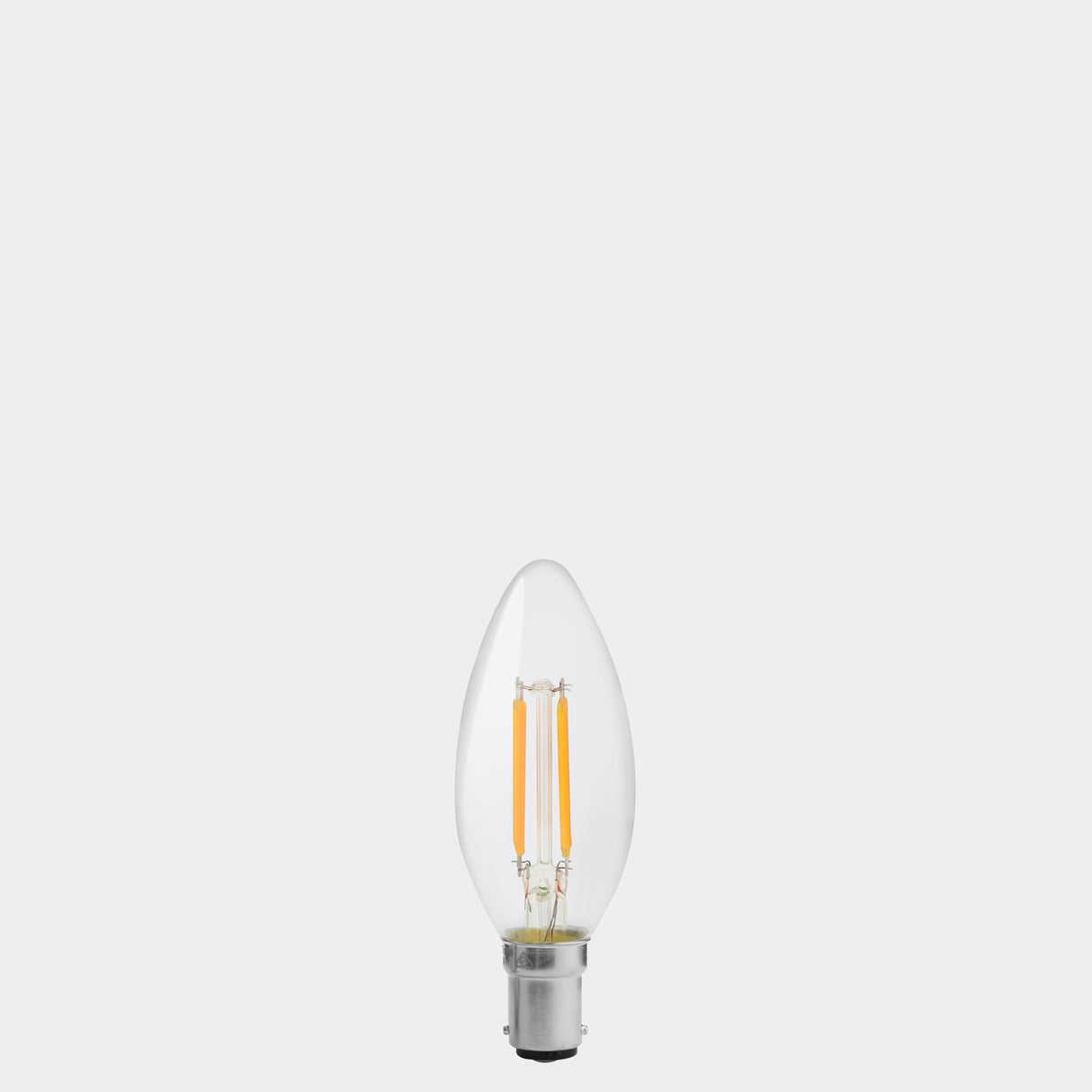 Dulora 4W B15 LED candle bulb in clear glass, shown unlit.