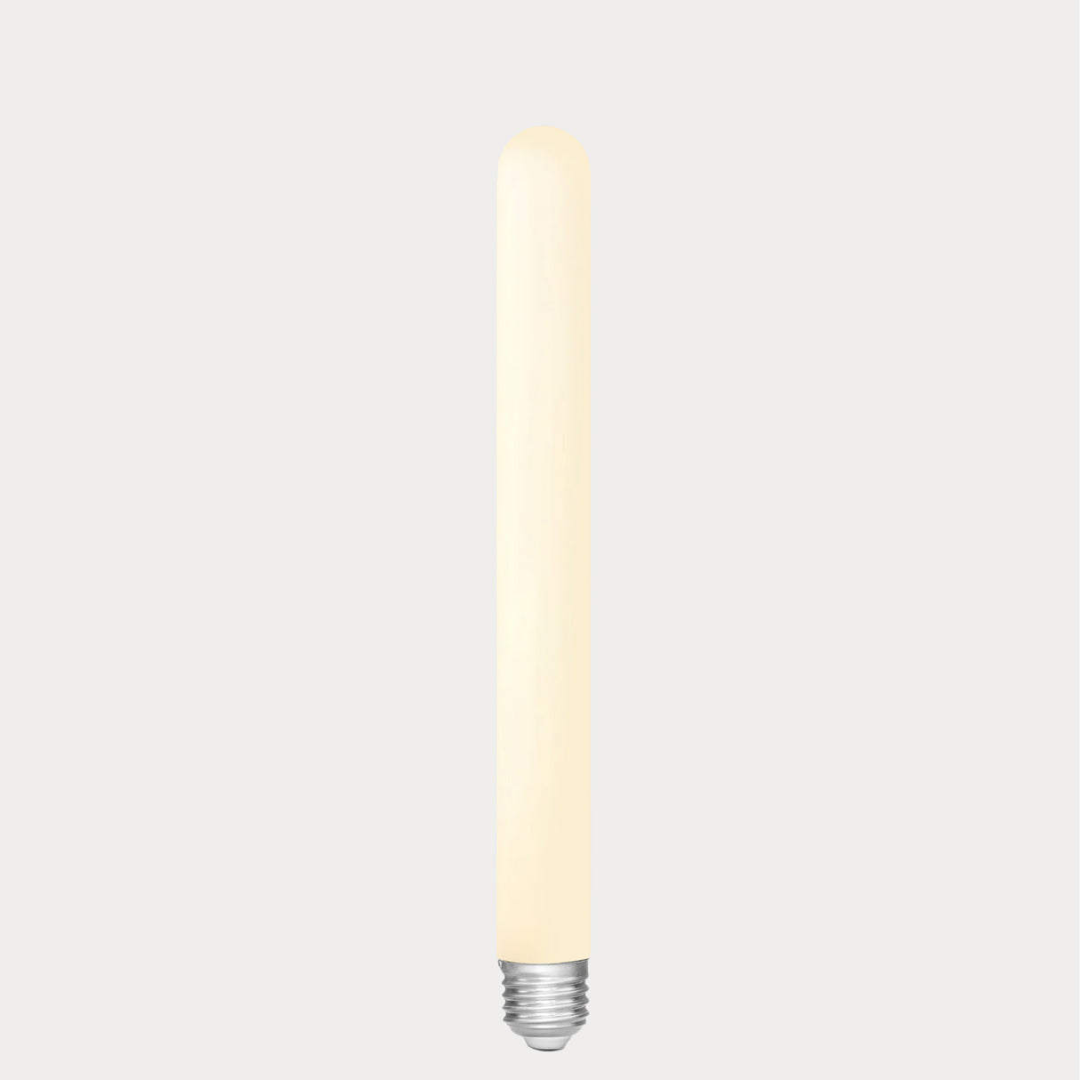 Dulora 4W Long Tube LED Bulb E27 Porcelain in Warm White glowing softly along the length of the porcelain tube