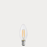 Dulora 4W B15 LED candle bulb in clear glass, shown unlit.