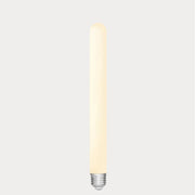 Dulora 4W Long Tube LED Bulb E27 Porcelain in Warm White glowing softly along the length of the porcelain tube