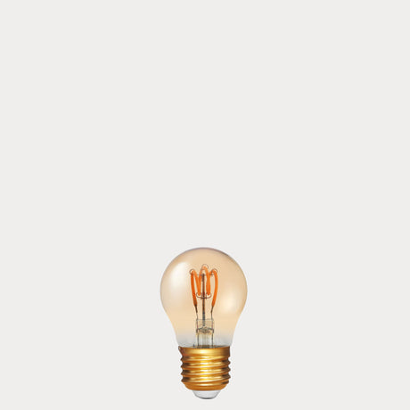 Dulora 4W Vintage Fancy Round LED Bulb E27 in Ultra Warm White with spiral filament visible through amber tinted glass