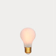 Dulora 6.5W E27 LED GLS bulb in frosted glass, glowing with 2200K extra warm white light