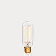 Dulora 6.5W E27 LED tubular filament bulb in clear glass, glowing with 2200K extra warm white light.